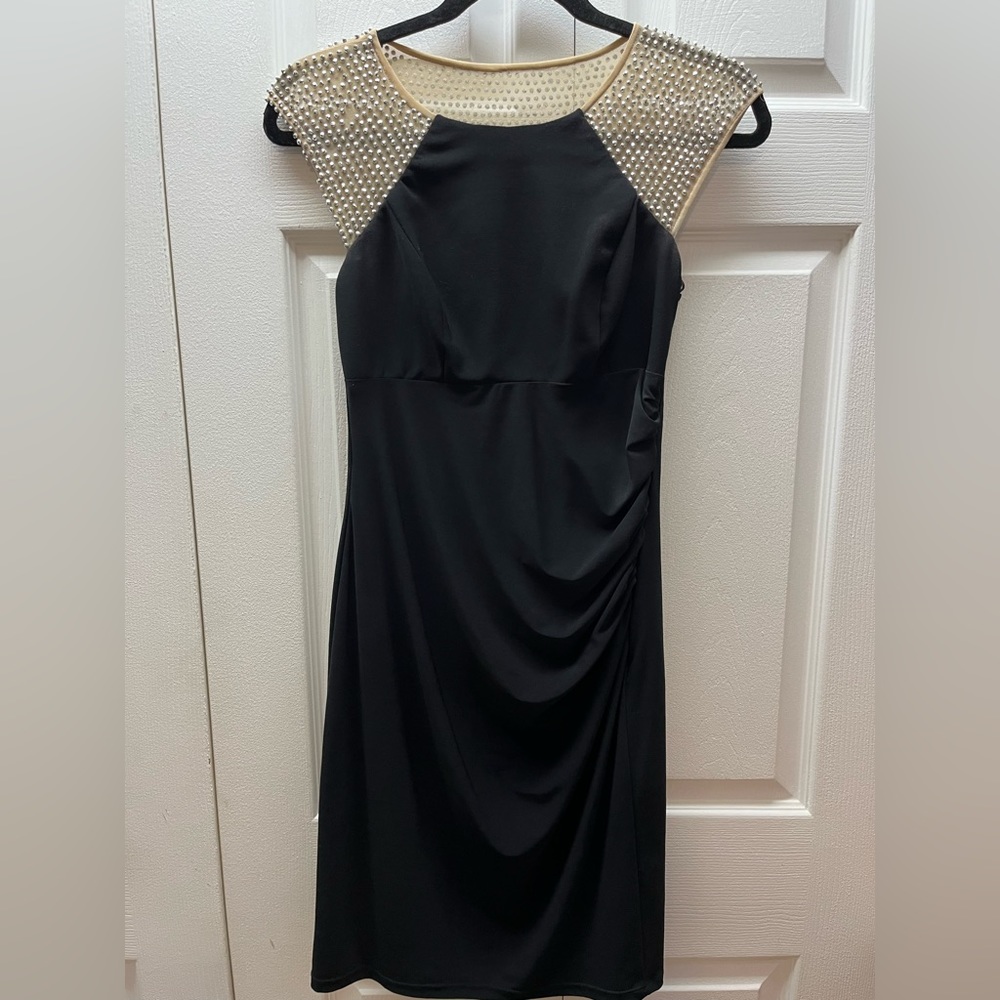 Xscape dress form fitted, tan color mesh with silver decals.